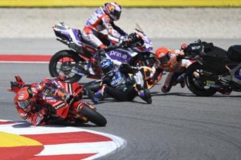 Galleria foto 'MotoGp Portogallo: Marquez, l’incidente e la ‘profezia’ di Rossi – Video' - foto 1