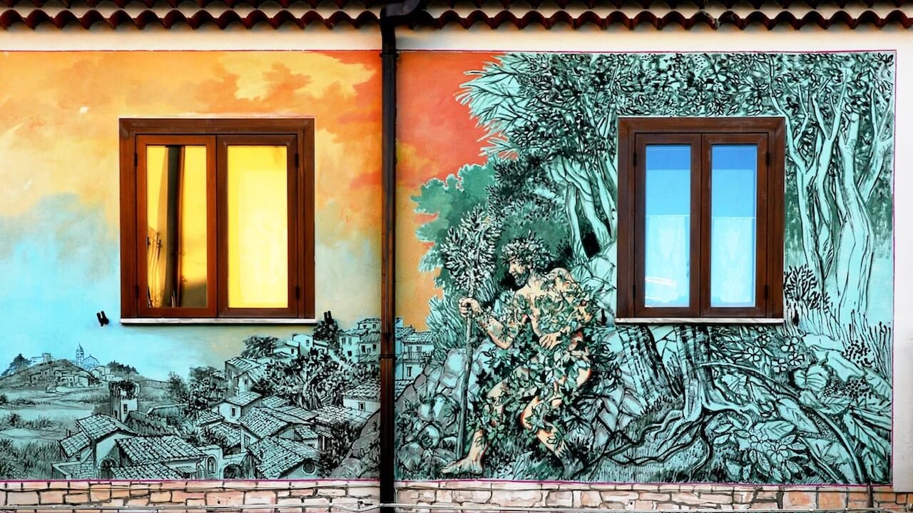 Viaggio nella street art che spinge il turismo in Puglia e Basilicata: così rivivono i borghi