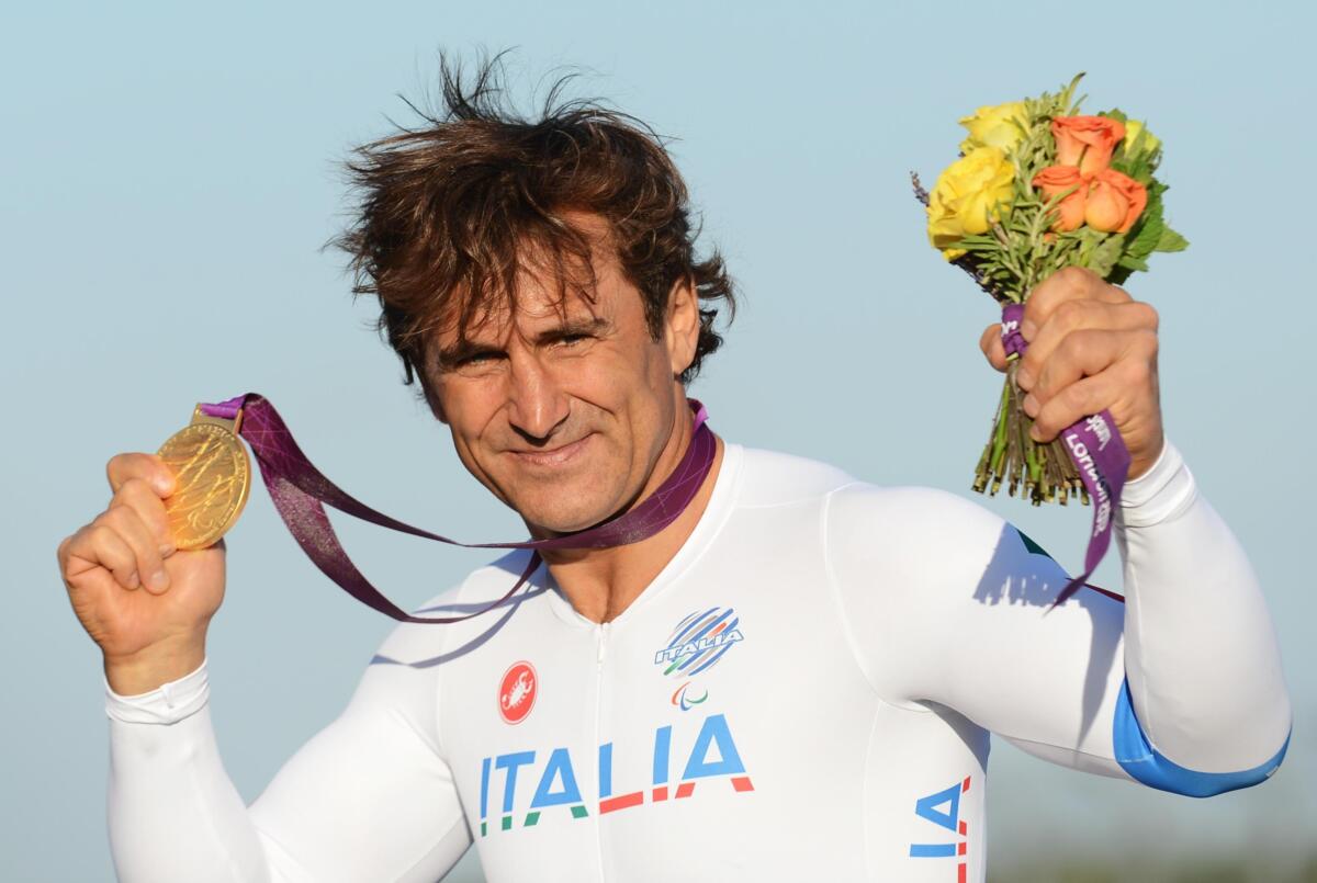 Galleria foto 'Alex Zanardi, la vita incredibile di un ironman dalle mille sfide tra auto, corse e ori' - foto 1