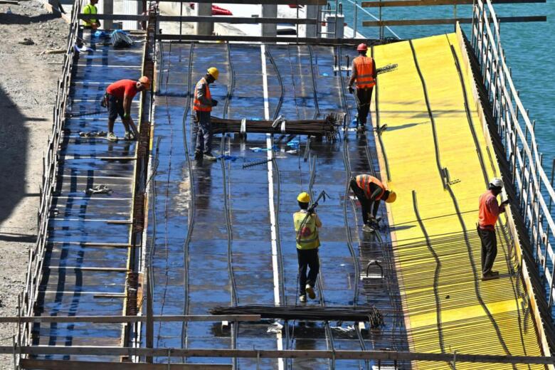 operai al lavoro